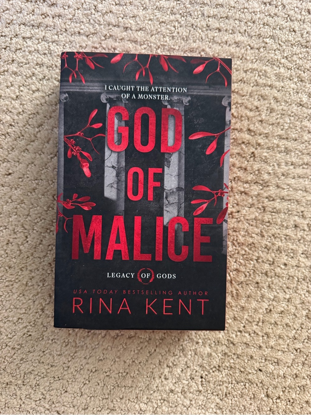 Source Unknown Black and Red "God of Malice" Paperback Book